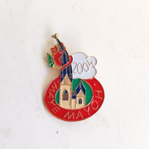 Vintage enamel lapel pin for the 2004 Mayo festival sold by Sweilems in Amman