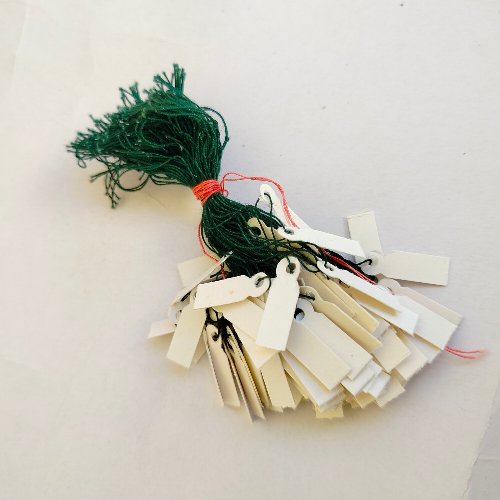 1000 count cotton string Price tags for jewelry and accessories Made in Greece detail photograph