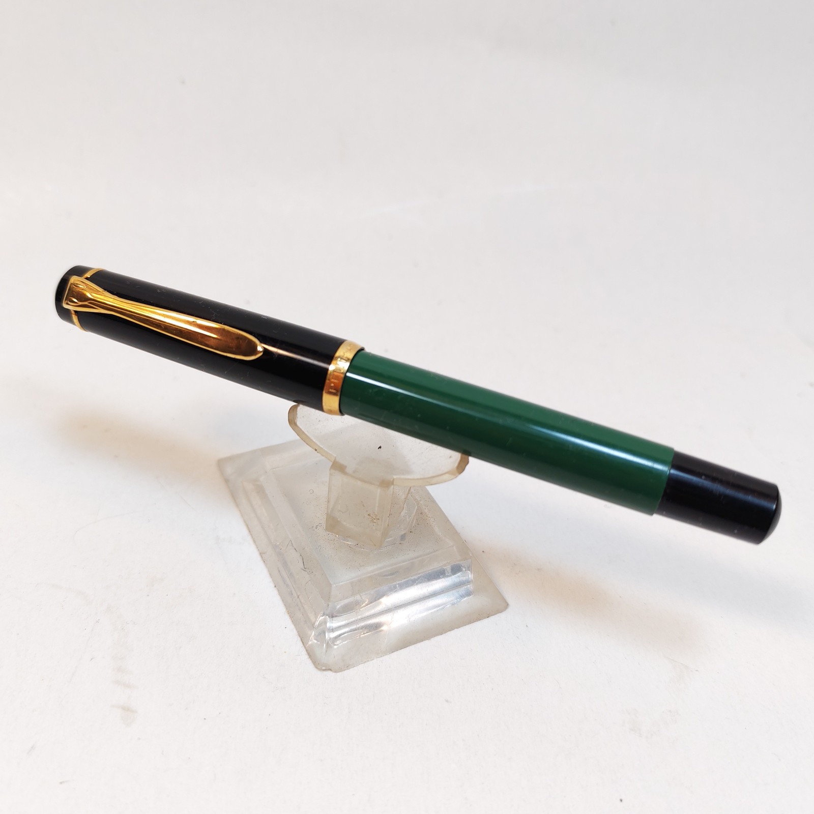 Vintage Pelikan m150 Fountain Pen Black with GT Made In Germany Piston fill detail photograph