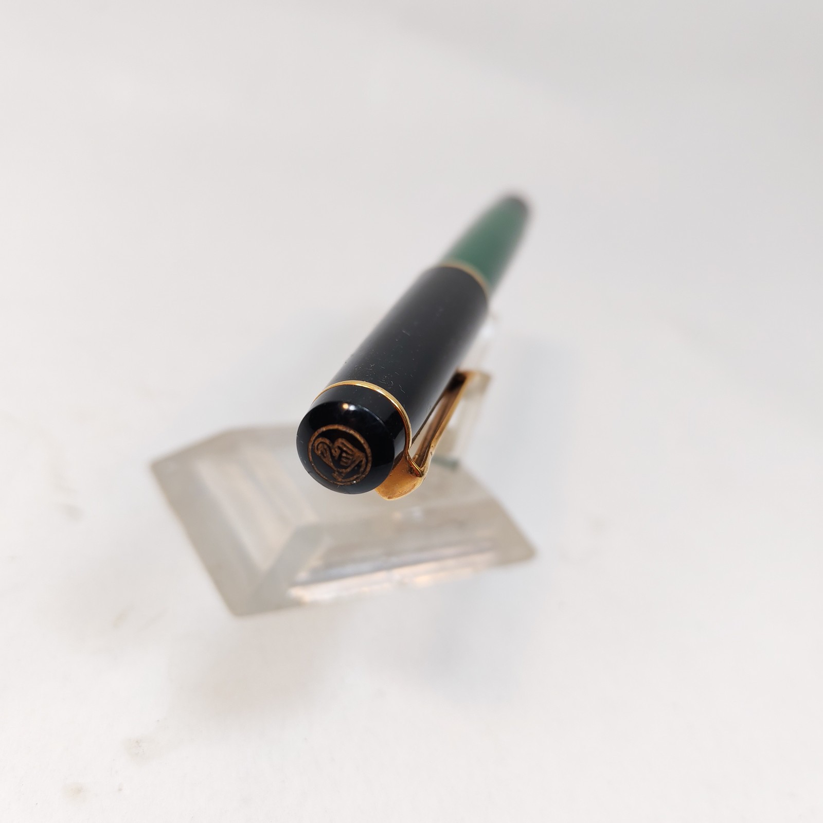 Vintage Pelikan m150 Fountain Pen Black with GT Made In Germany Piston fill detail photograph