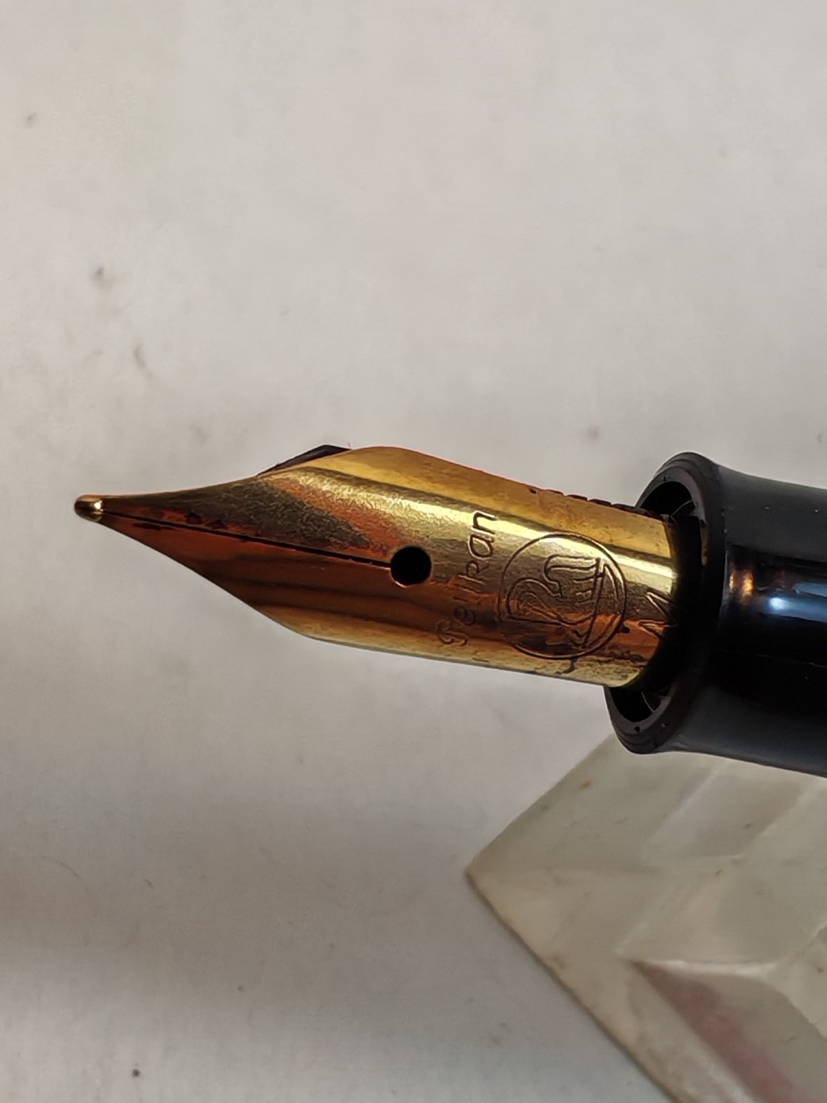 Vintage Pelikan m150 Fountain Pen Black with GT Made In Germany Piston fill detail photograph