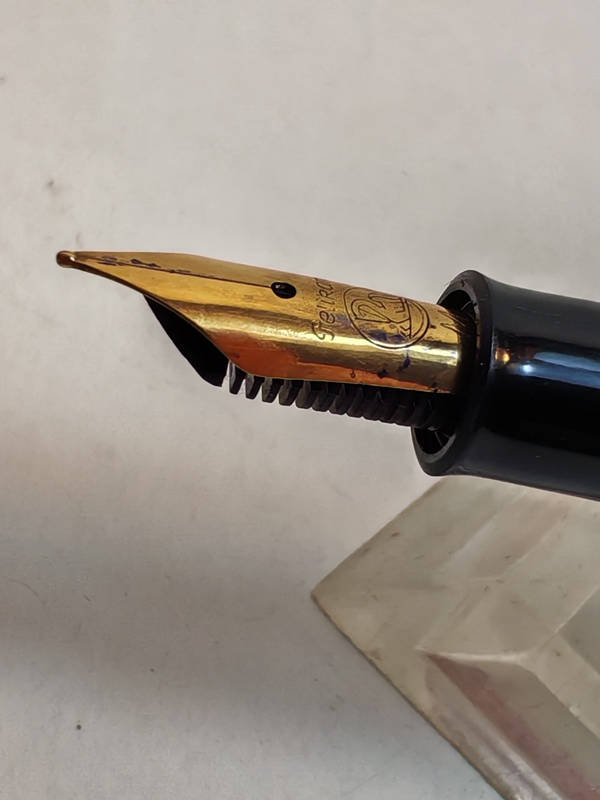 Vintage Pelikan m150 Fountain Pen Black with GT Made In Germany Piston fill detail photograph
