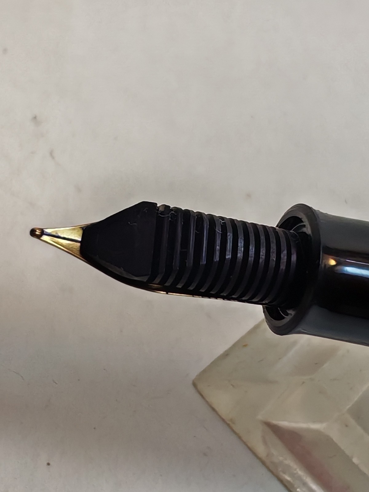 Vintage Pelikan m150 Fountain Pen Black with GT Made In Germany Piston fill detail photograph