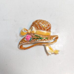 vintage Monet gold-tone hat brooch sold by Sweilems in Amman