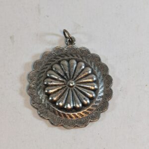 silver-toned, Western or Southwestern-inspired concho pendant 1.5"