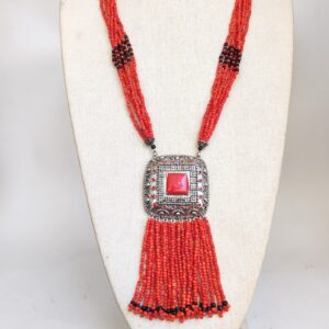 Vintage Red Faux Coral Beaded Necklace with Silver Tone Pendant and Tassel sold by Sweilems in Amman