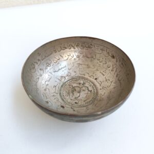 antique tinned copper bowl features hand-engraved Islamic calligraphy