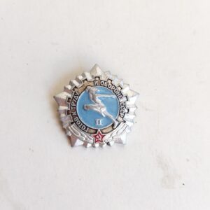 Russian pinback pin button Soviet Union USSR 1940s Mikhail Gorbachev ice skating sold by Sweilems in Amman