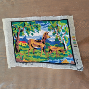 vintage hand-stitched needlepoint canvas depicting a landscape Deer sold by Sweilems in Amman