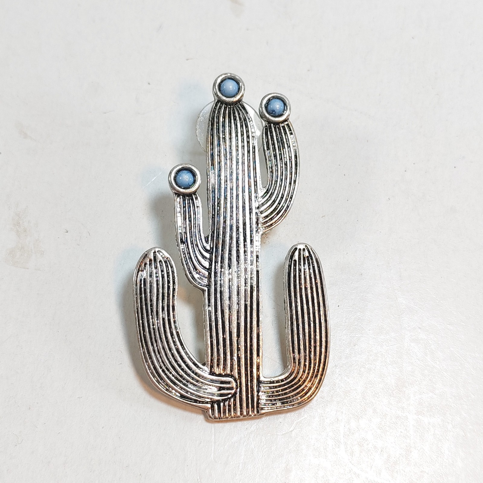 Cactus Metal pin or single earing 2 sold by Sweilems in Amman