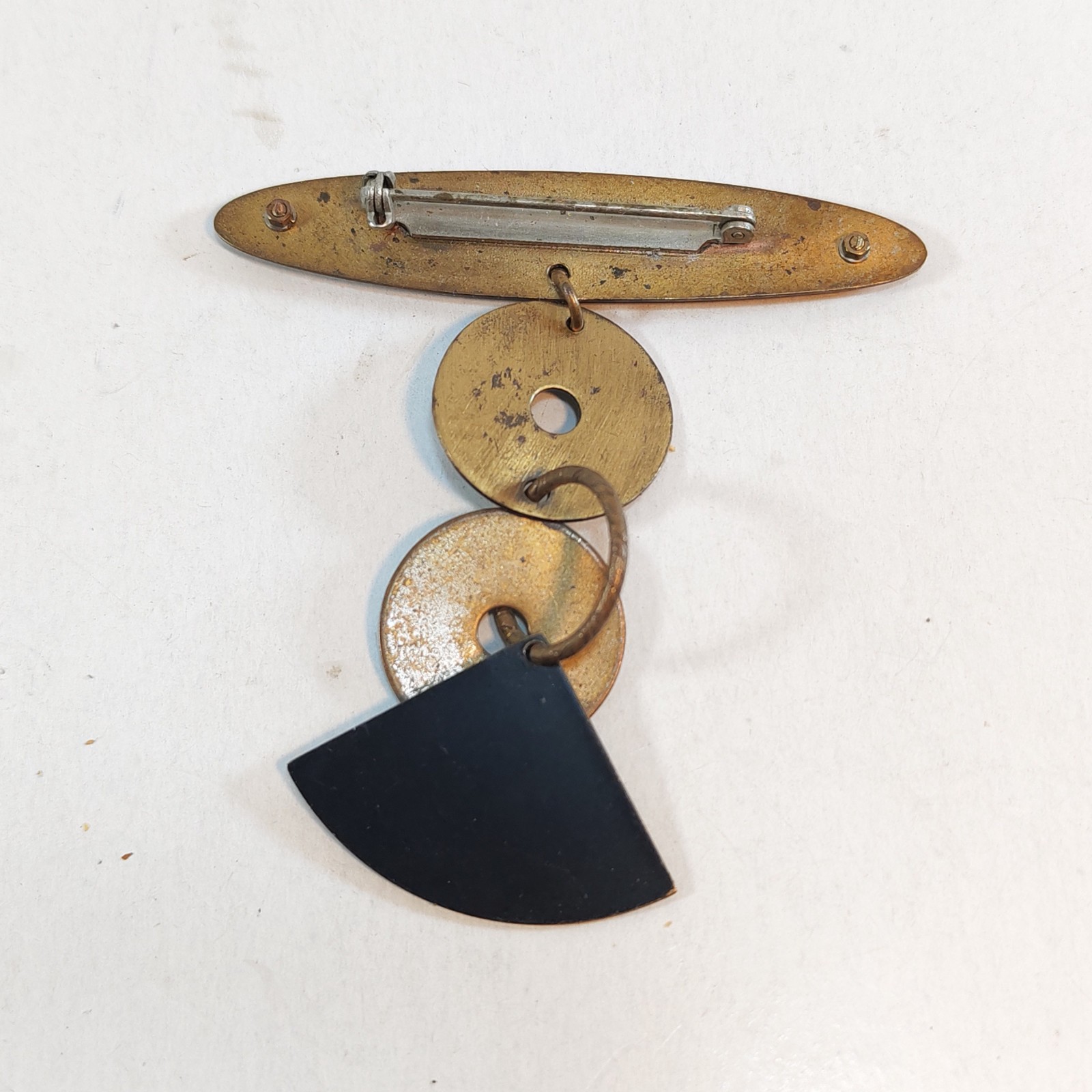 intage Multimetal Modernist Dangle Brooch Pin Etched Copper Brooch Pin detail photograph