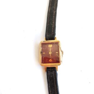 vintage gold-tone Orient Quartz rectangular watch sold by Sweilems in Amman