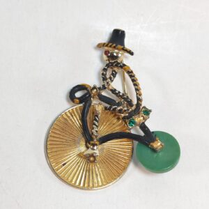 VINTAGE 50's Figural Realistic Shape Black Enamel Man Riding Bicycle Brooch 2 sold by Sweilems in Amman