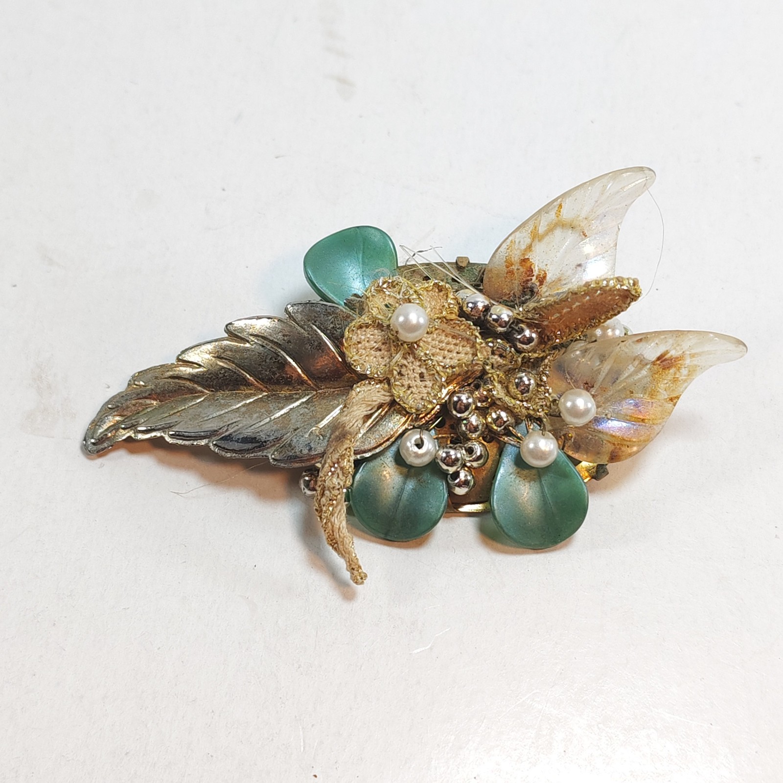 Vintage 2 5 brass back flower and leafs brooch handmade sold by Sweilems in Amman