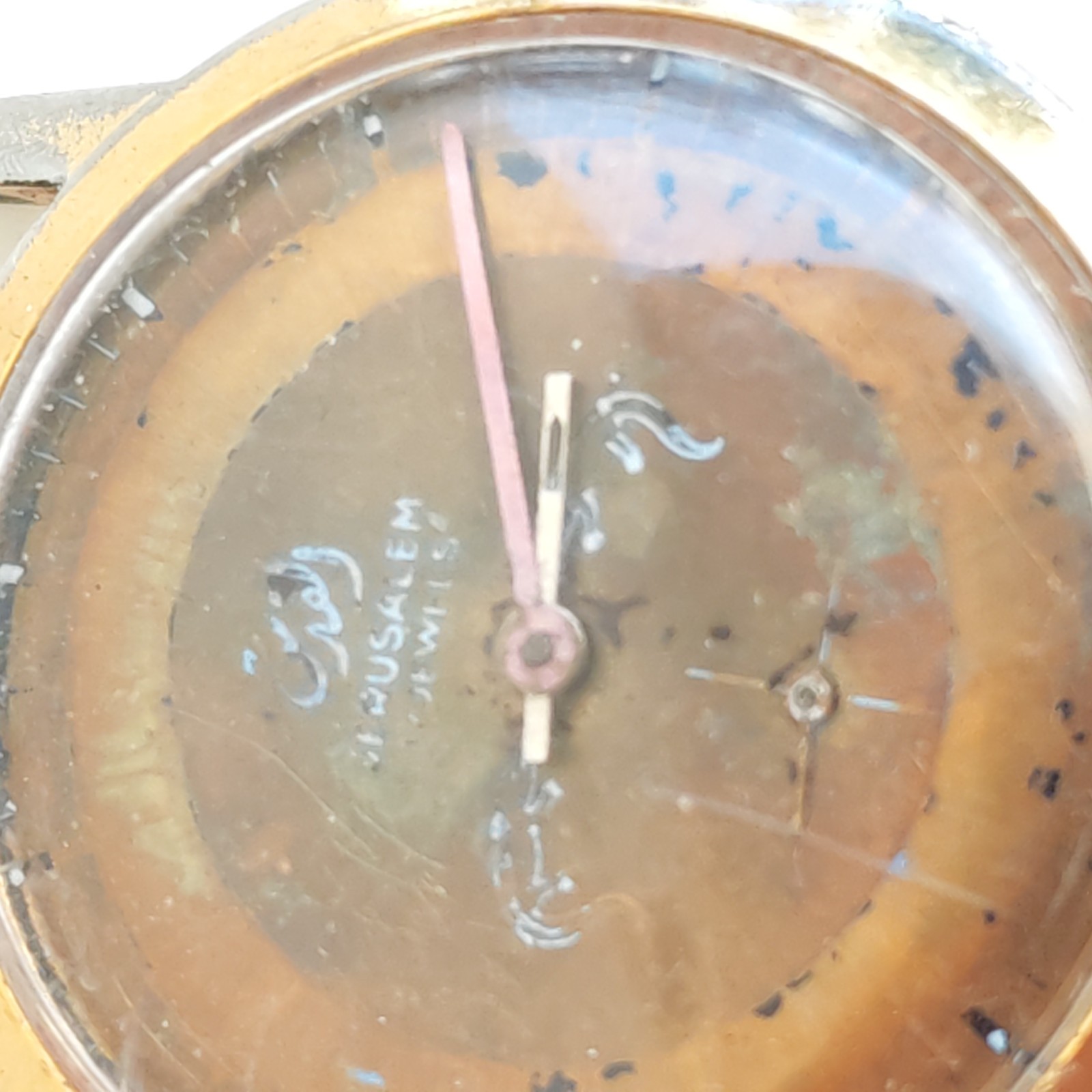 vintage Jerusalem hand winding watch needs repair detail photograph