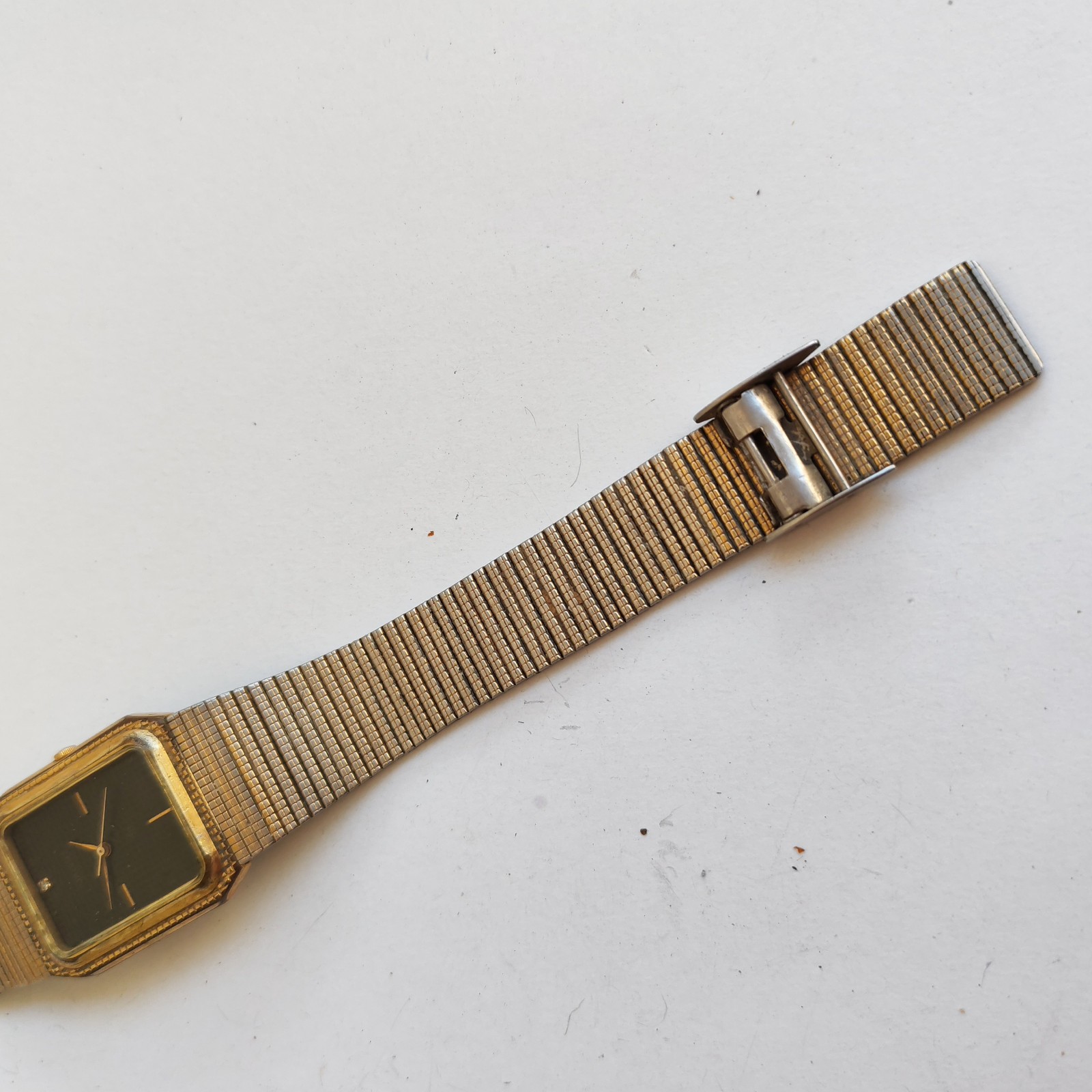 vintage Orient rectangular wristwatch detail photograph