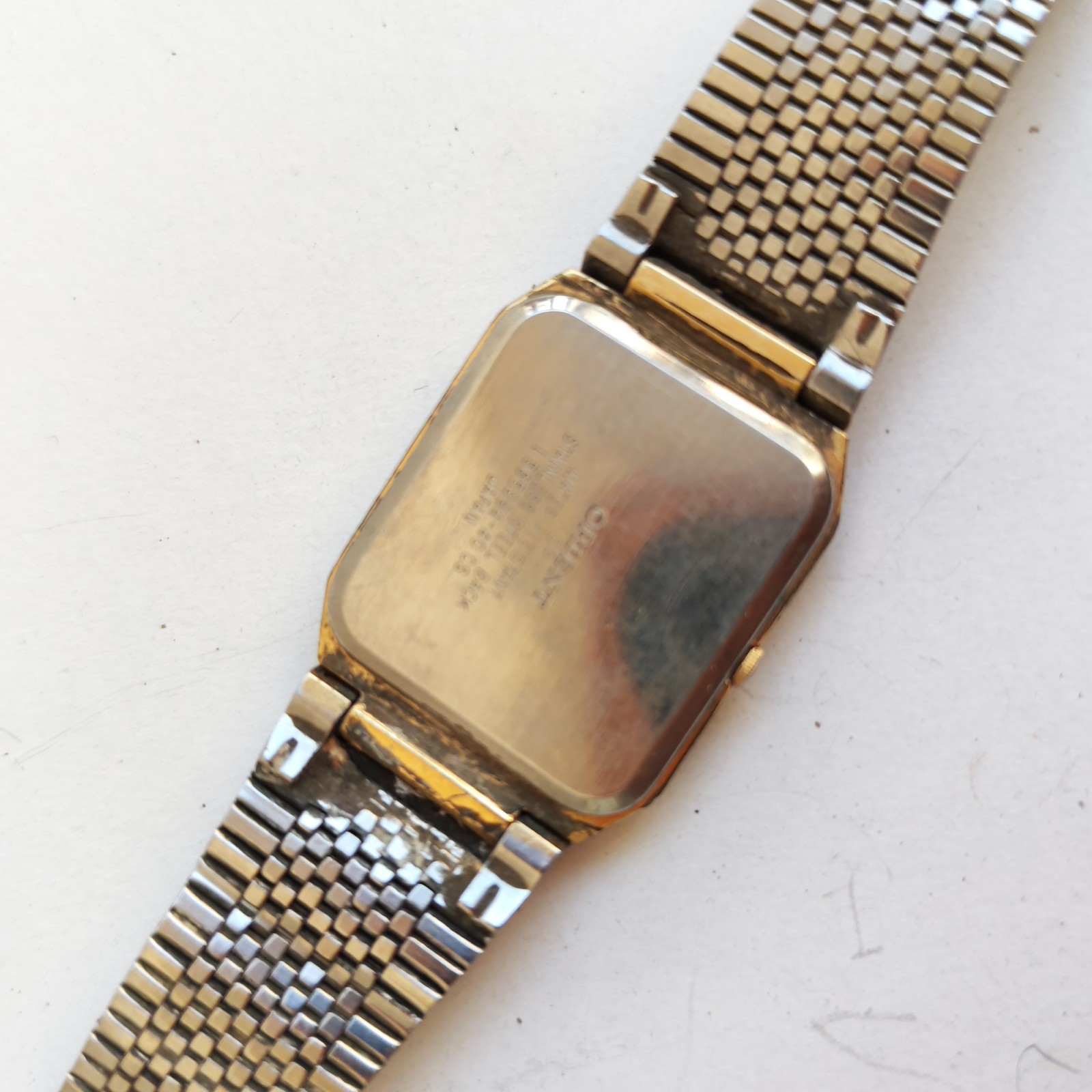 vintage Orient rectangular wristwatch detail photograph