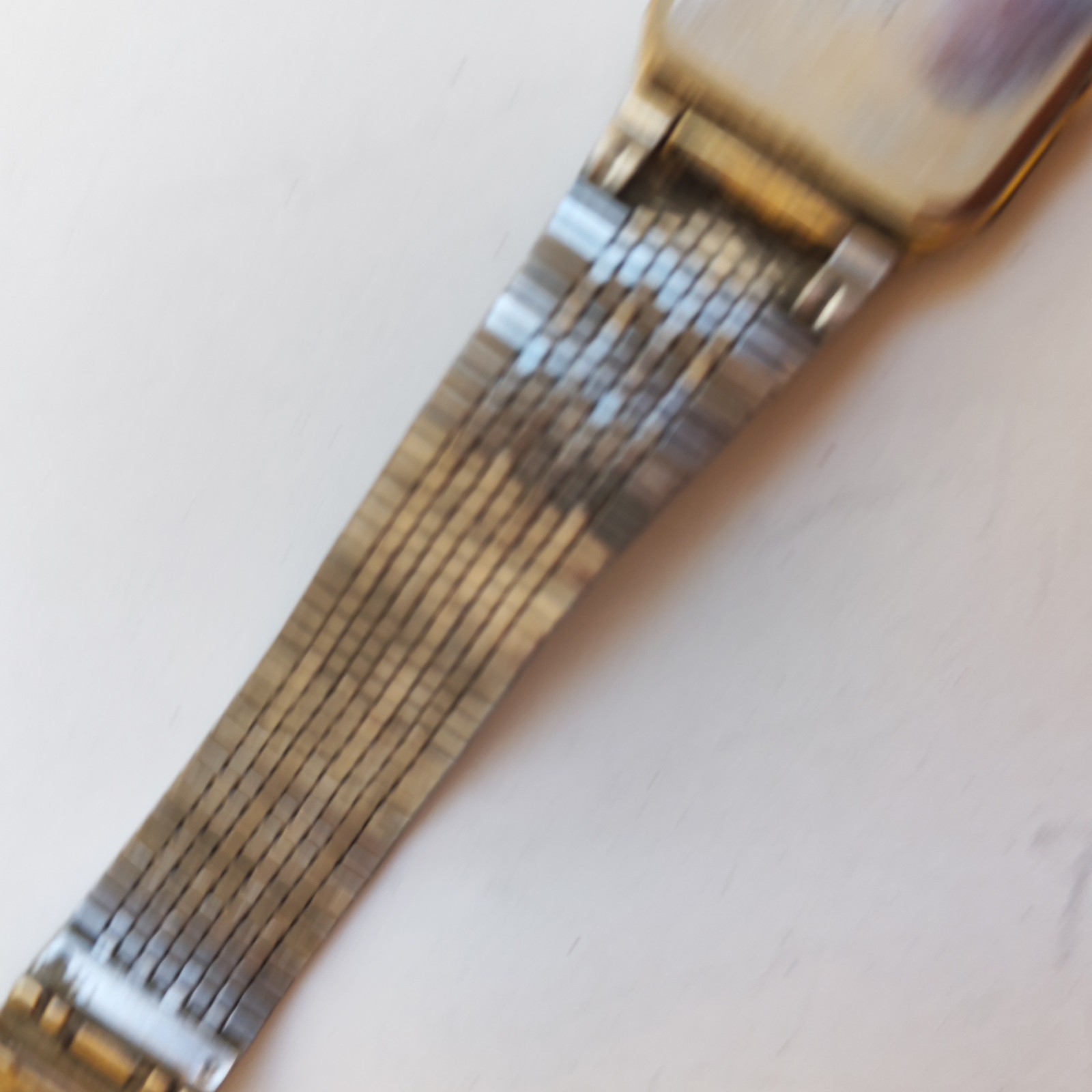 vintage Orient rectangular wristwatch detail photograph