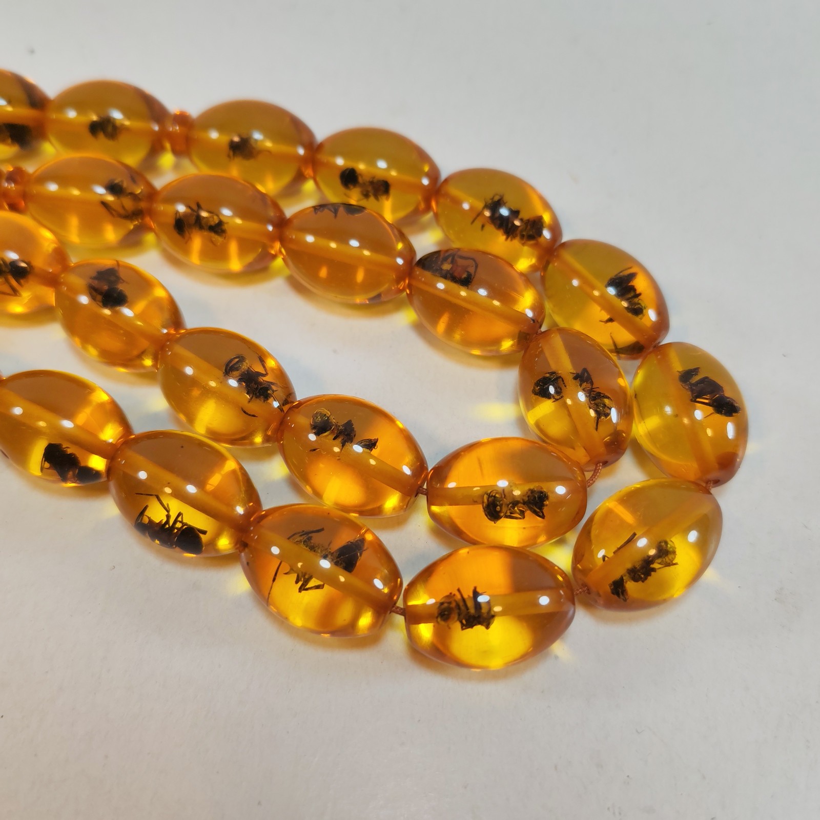 33 Beads Pressed Amber Tasbih Insect Inclusion Prayer Beads 19 13mm detail photograph