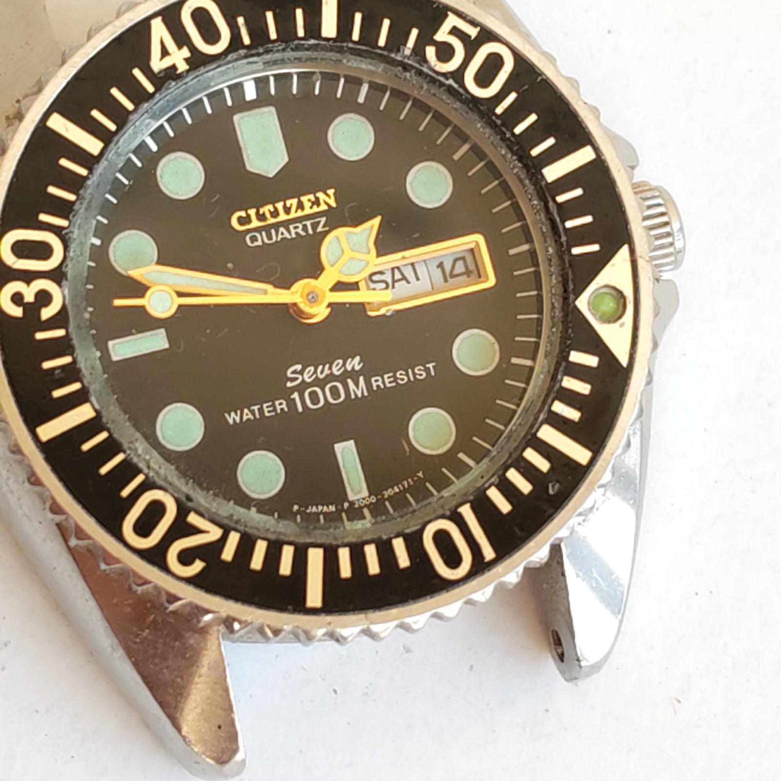 Citizen Seven Quartz Day Date 100M Diver detail photograph