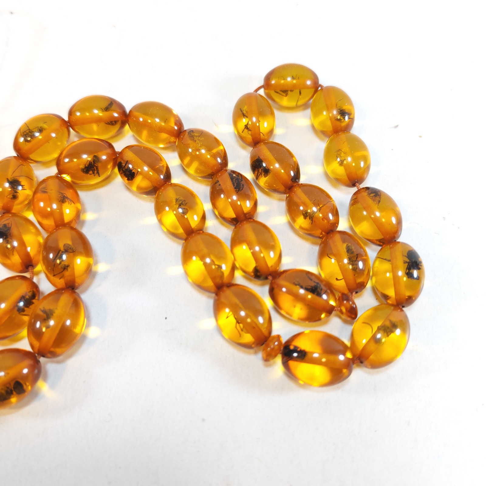33 Beads Pressed Amber Tasbih Insect Inclusion Prayer Beads Misbaha 15 11mm detail photograph
