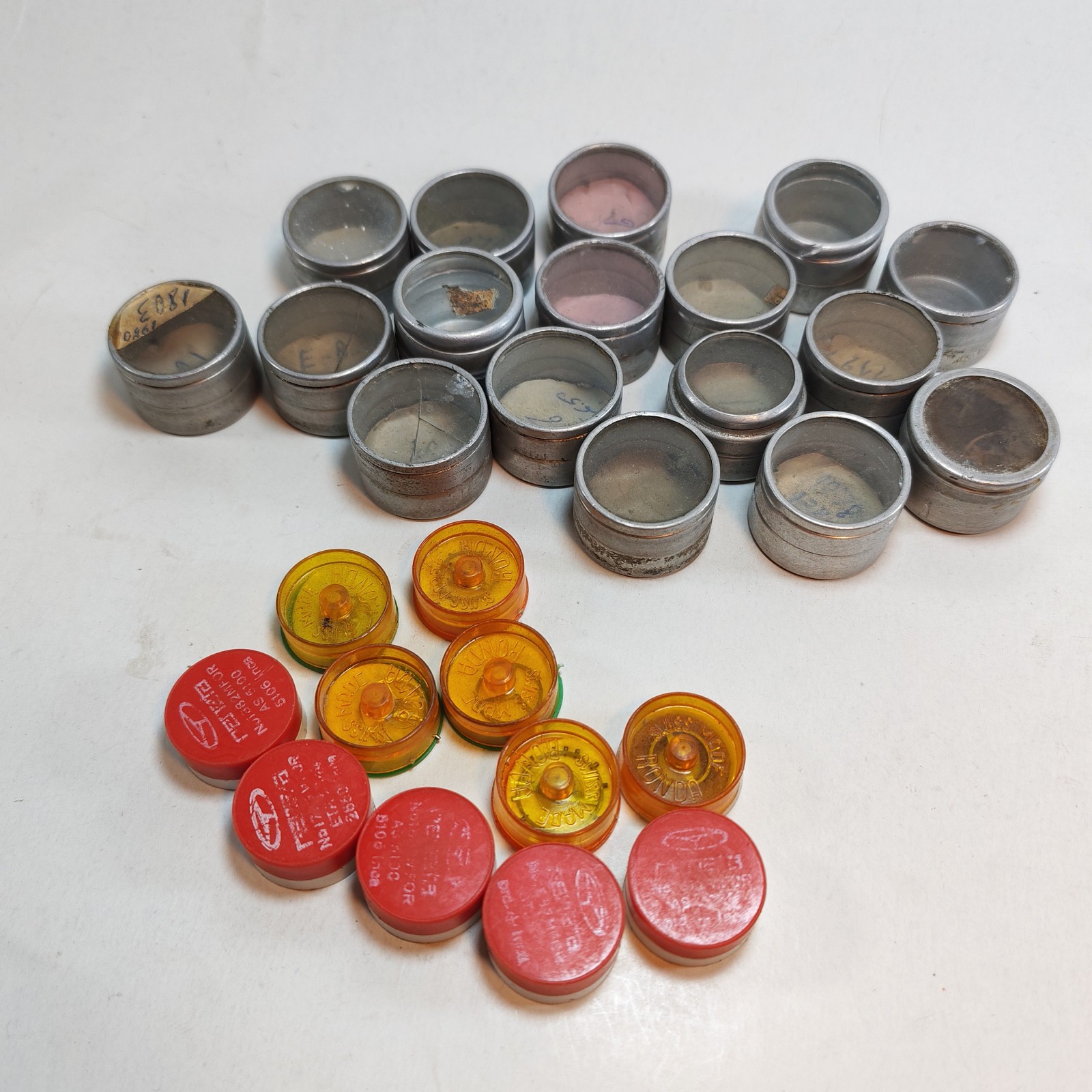 Vintage Small Watch Parts Storage Tin Lot and some watch parts lot detail photograph