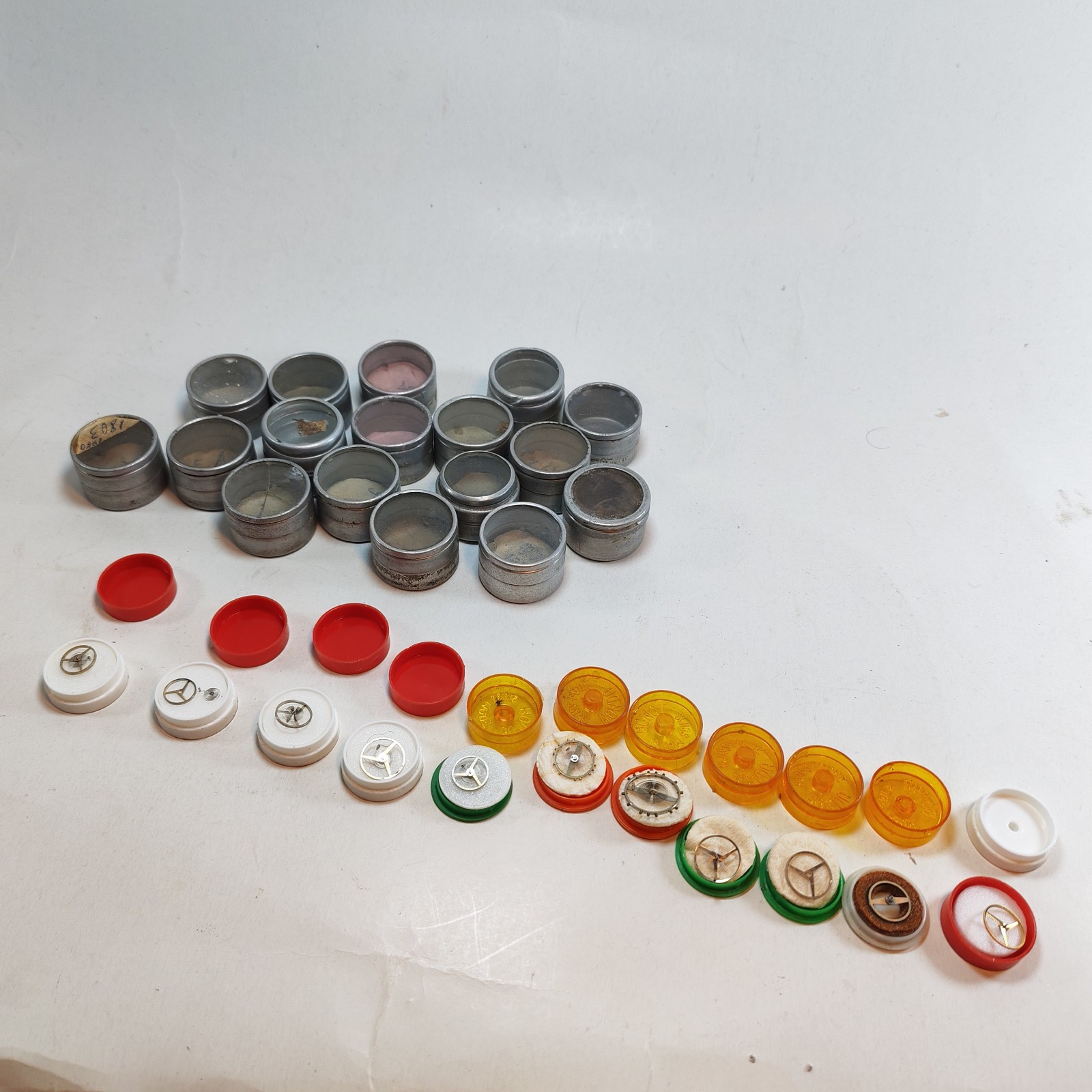 Vintage Small Watch Parts Storage Tin Lot and some watch parts lot sold by Sweilems in Amman