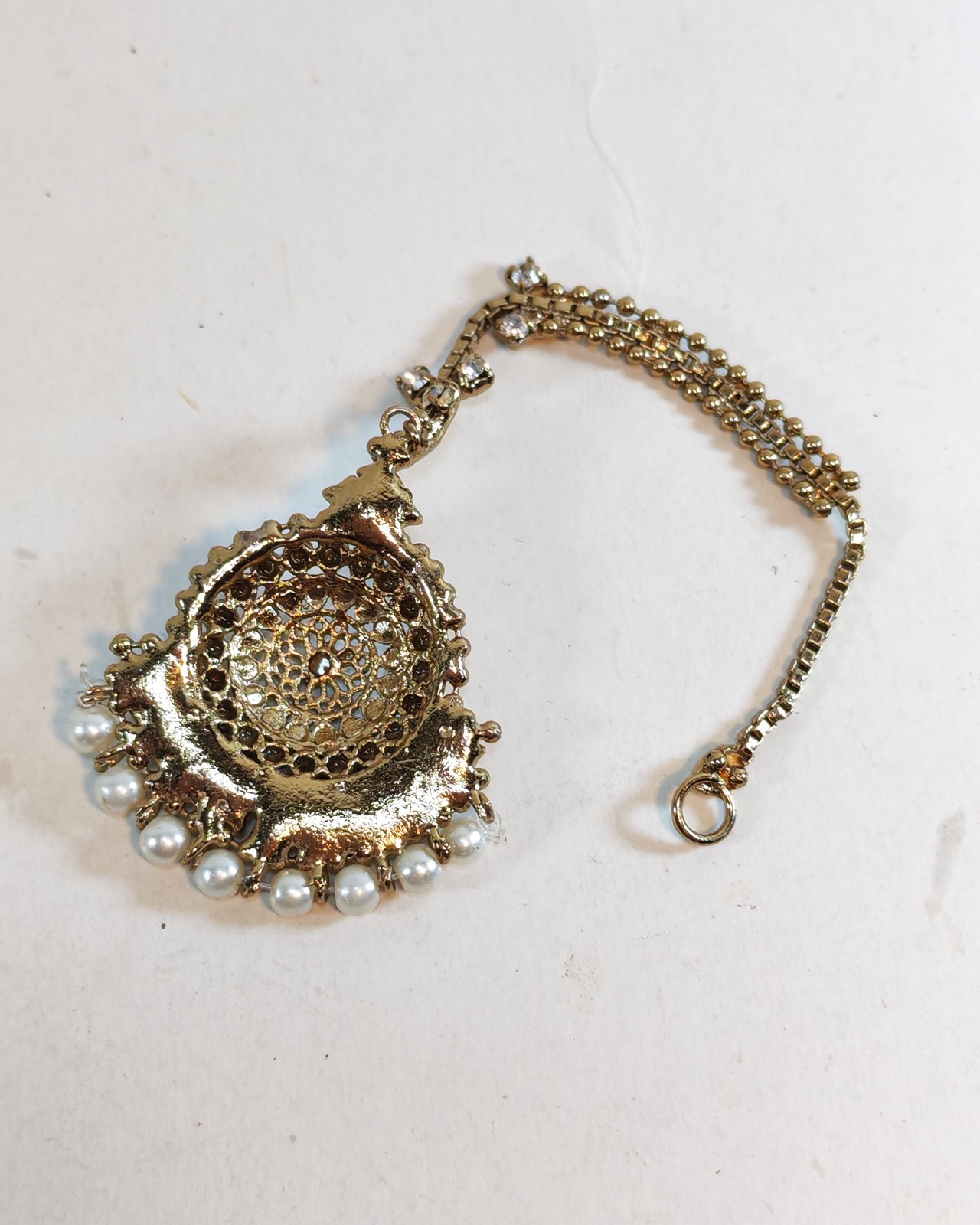 maang tikka a traditional Indian headpiece 6 detail photograph