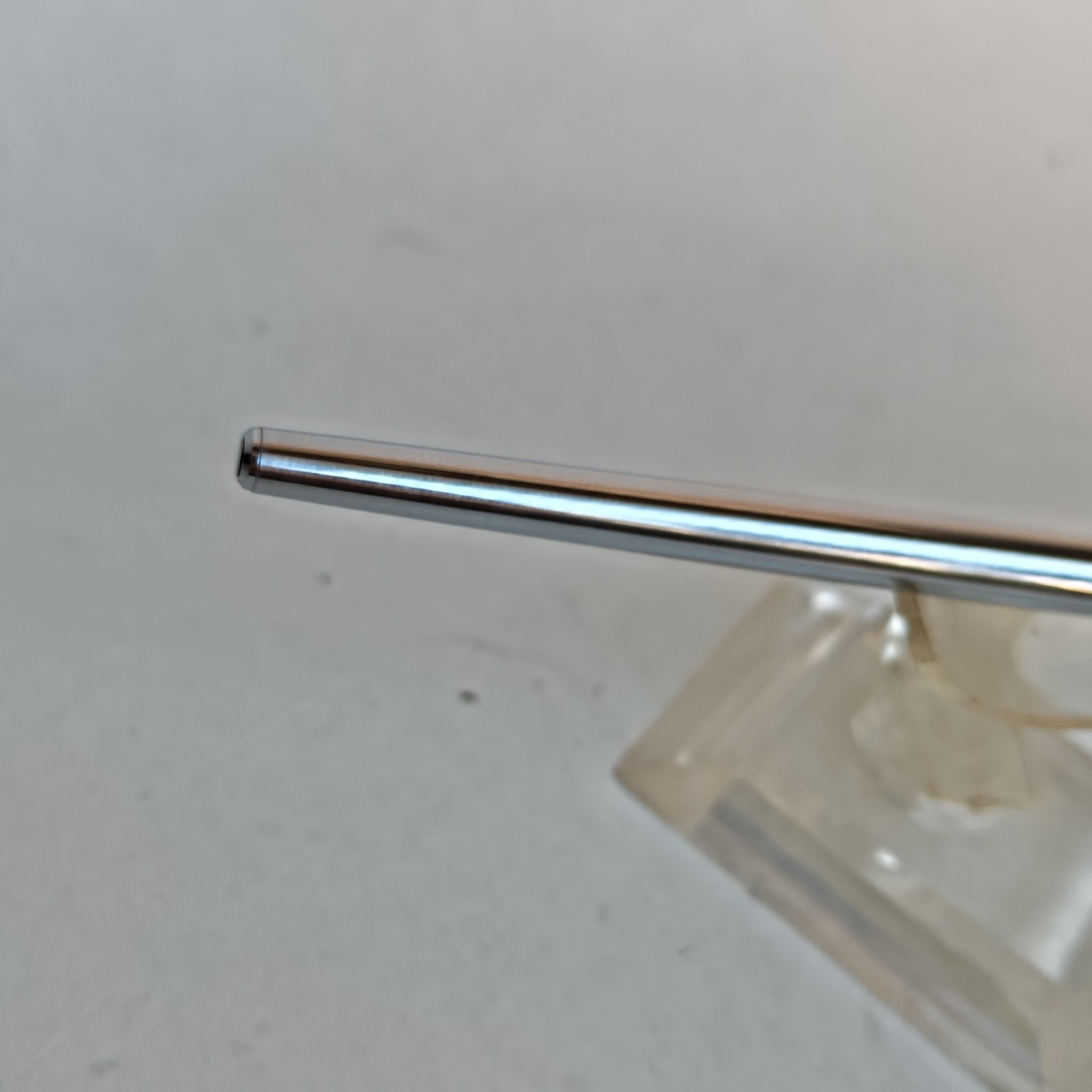 Vintage slim ballpoint pen with the letter B as logo detail photograph