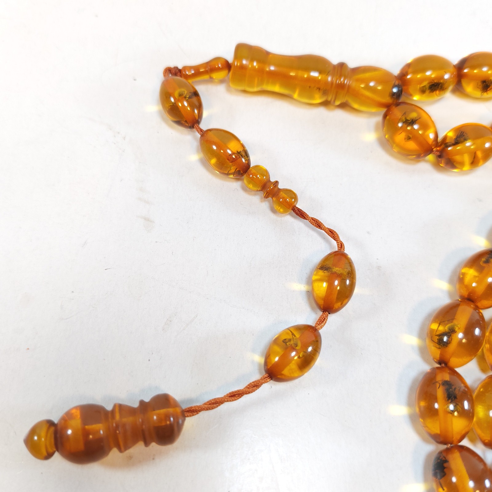 33 Beads Pressed Amber Tasbih Insect Inclusion Prayer Beads Misbaha detail photograph