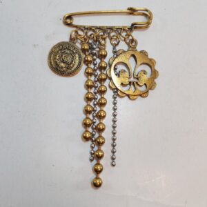 Vintage Brass safety pin brooch dangling scouts logo 3 sold by Sweilems in Amman