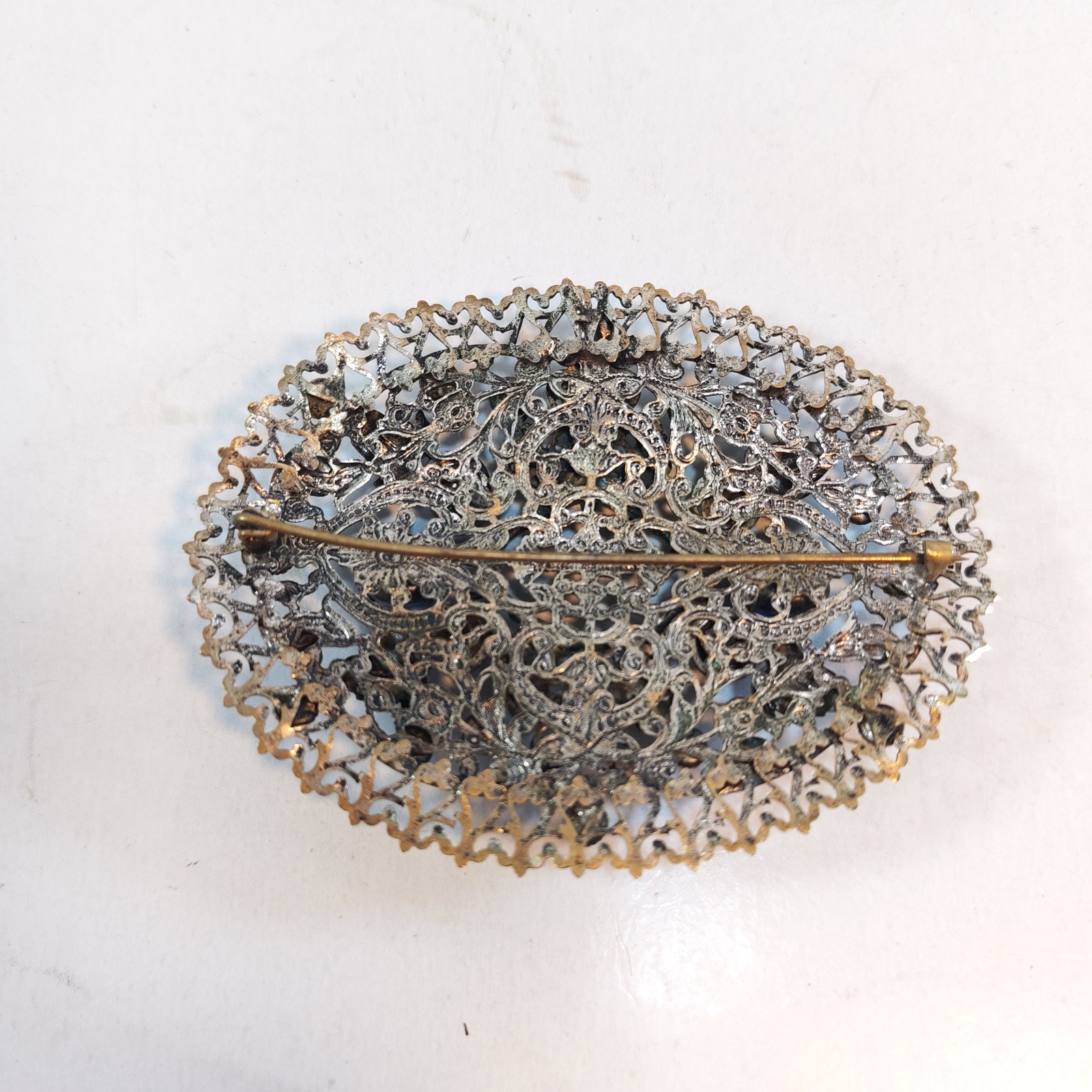 Vintage metal brooch 3 missing some glass beads detail photograph