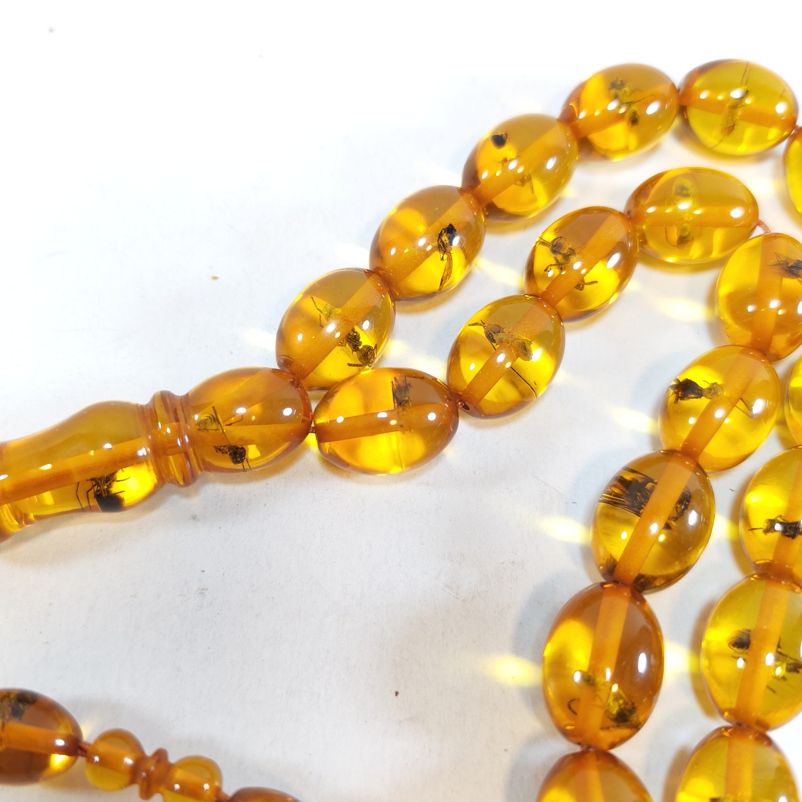 33 Beads Pressed Amber Tasbih Insect Inclusion Prayer Beads Misbaha detail photograph